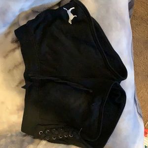 Brand pink color black shorts with laces on side